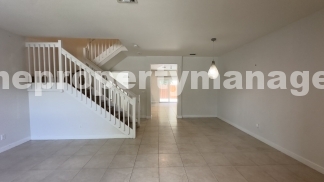 Spacious 3-Bedroom Townhouse with Gleaming Hardwood Floors in West Palm Beach!