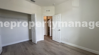 Spacious 3-Bedroom Townhouse with Gleaming Hardwood Floors in West Palm Beach!