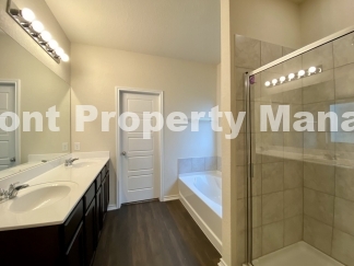 Gorgeous 4 Bedroom 2.5 Bath home w Upstairs Loft in Hunters Ranch Community!