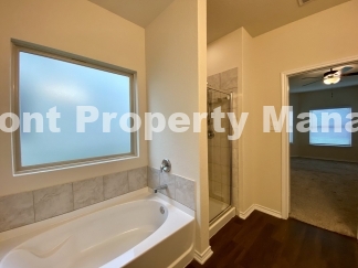 Gorgeous 4 Bedroom 2.5 Bath home w Upstairs Loft in Hunters Ranch Community!