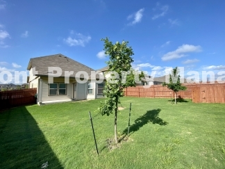 Gorgeous 4 Bedroom 2.5 Bath home w Upstairs Loft in Hunters Ranch Community!