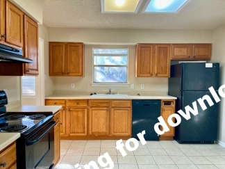 Corner Lot Home Near Great Schools at 8600 Wood Wind Dr