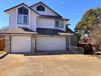 Spacious 4 Bedroom Stone Oak Home with Three Car Garage