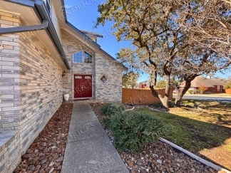 Spacious 4 Bedroom Stone Oak Home with Three Car Garage
