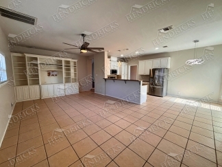 Spacious 4 Bedroom Stone Oak Home with Three Car Garage