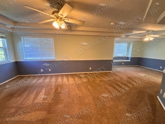 Spacious 4 Bedroom Stone Oak Home with Three Car Garage