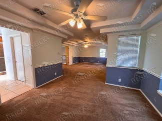 Spacious 4 Bedroom Stone Oak Home with Three Car Garage