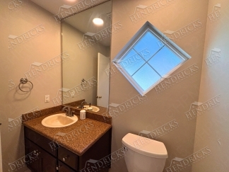 Spacious 4 Bedroom Stone Oak Home with Three Car Garage