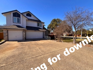 Spacious 4 Bedroom Stone Oak Home with Three Car Garage