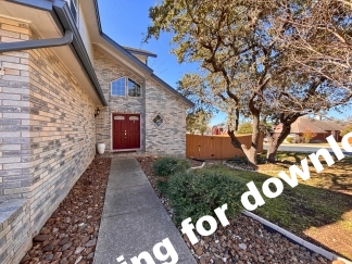 Spacious 4 Bedroom Stone Oak Home with Three Car Garage