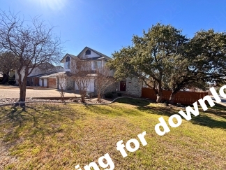 Spacious 4 Bedroom Stone Oak Home with Three Car Garage