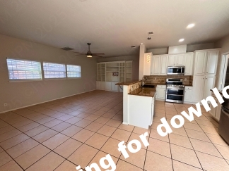 Spacious 4 Bedroom Stone Oak Home with Three Car Garage