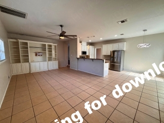 Spacious 4 Bedroom Stone Oak Home with Three Car Garage