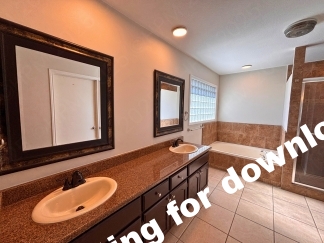 Spacious 4 Bedroom Stone Oak Home with Three Car Garage