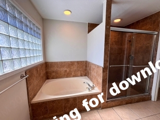 Spacious 4 Bedroom Stone Oak Home with Three Car Garage