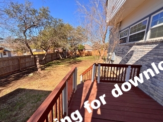 Spacious 4 Bedroom Stone Oak Home with Three Car Garage