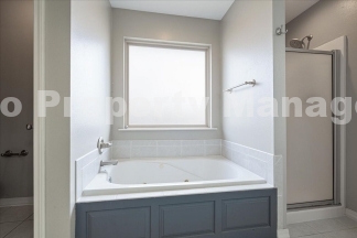 Discover this spacious 4-bedroom, 2-bath home