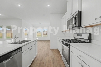 Discover this spacious 4-bedroom, 2-bath home in Farmington,