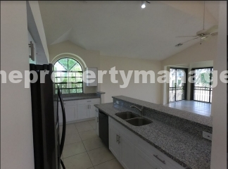 Bright & Spacious Condo with Vaulted Ceilings!