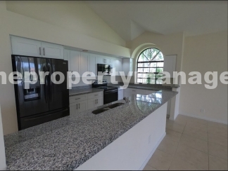 Bright & Spacious Condo with Vaulted Ceilings!