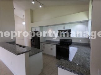 Bright & Spacious Condo with Vaulted Ceilings!