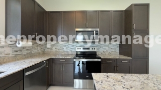 Spacious 4-Bedroom End-Unit Townhome with Beautiful Lake Views