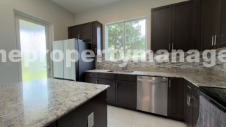 Spacious 4-Bedroom End-Unit Townhome with Beautiful Lake Views