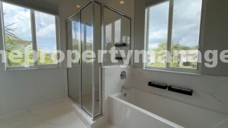Spacious 4-Bedroom End-Unit Townhome with Beautiful Lake Views